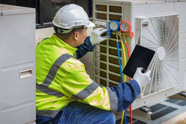 Professional Hvac technician working in Swansea, MA